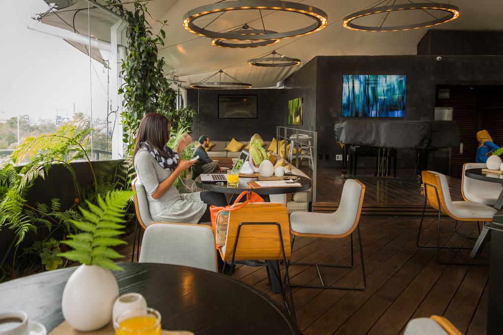 Suites Contempo Mexico City Exterior photo The lounge at the airport
