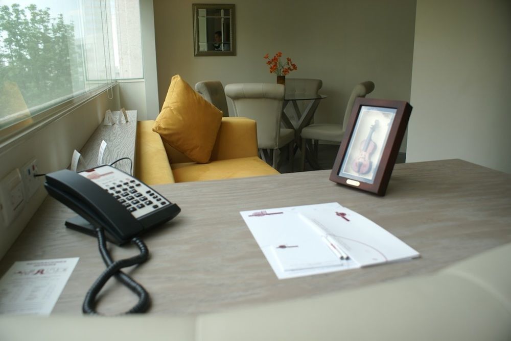 Suites Contempo Mexico City Exterior photo A desktop video phone