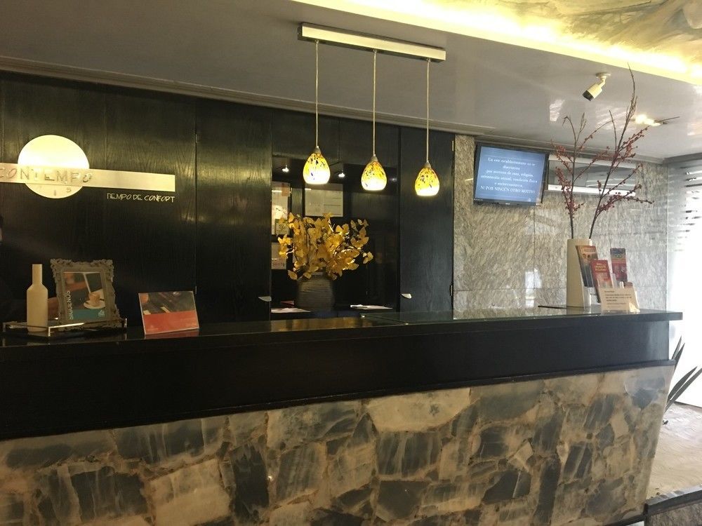 Suites Contempo Mexico City Exterior photo Reception desk at the hotel