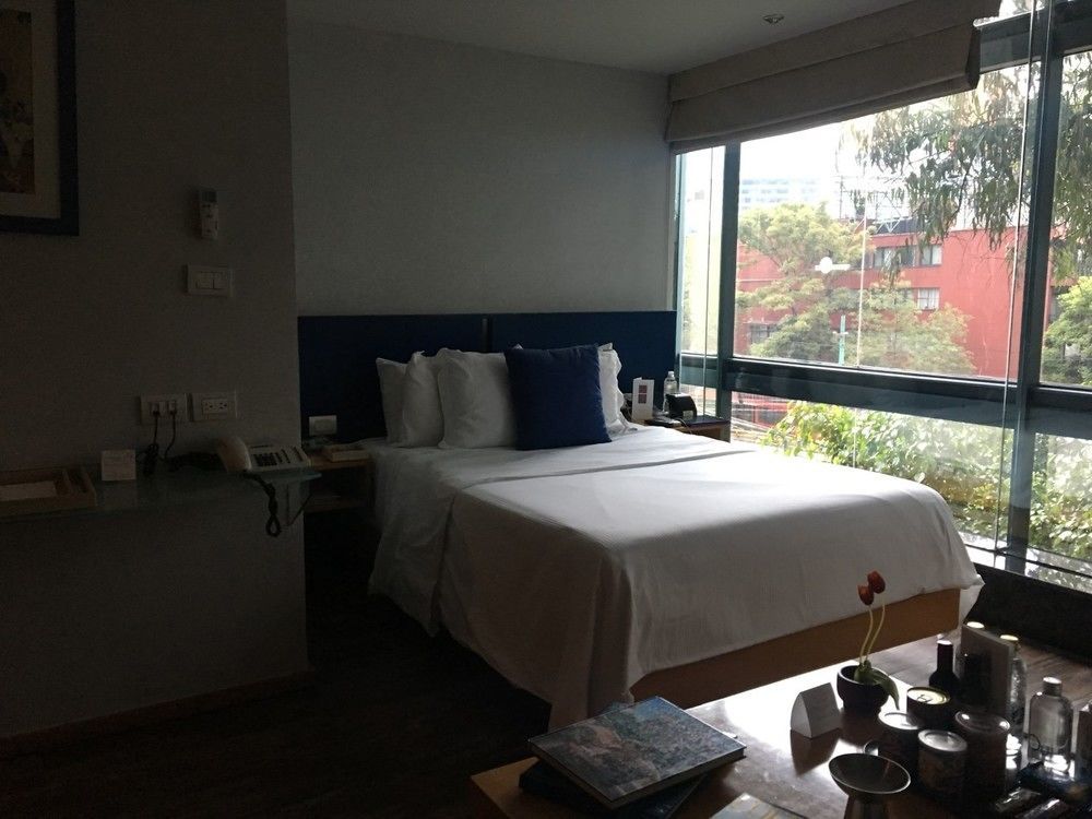 Suites Contempo Mexico City Exterior photo A bedroom at the hotel
